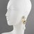 Cilea Paris designed these charming dimensional dangling hand-made clip-on earrings. They feature baroque-inspired...