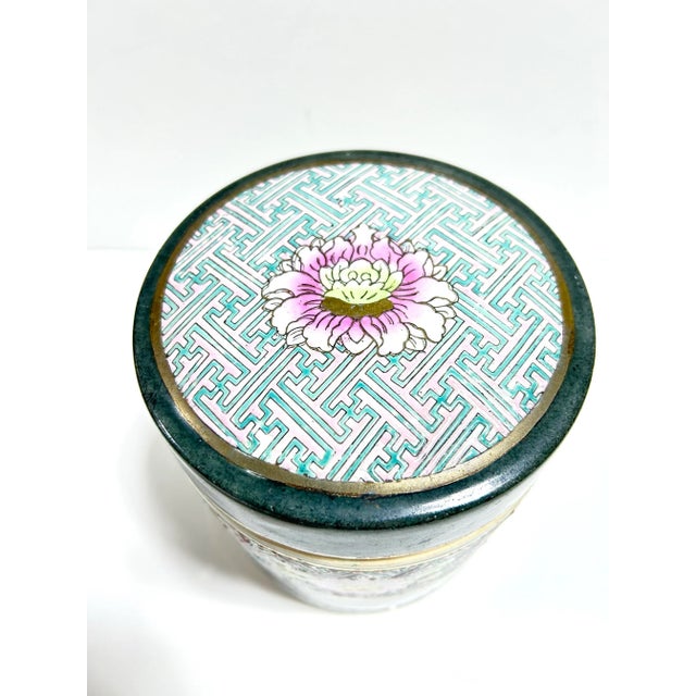 A very eclectic color combination makes you do a double-take in a good way on this piece! That wonderful purple blossom...