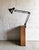 This black, extendable architect's/desk lamp by RIMSA Brevetti Longoni dates from the 1960s and is designed in the...