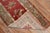 Early 20th century red field Turkish runner with an all-over repetitive flower design on a red field. The border is in...