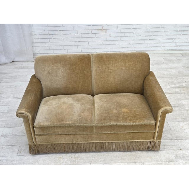 1970s, Danish 2-seater sofa. Original green furniture velour, round beech wood legs, springs in the seat. Original very...