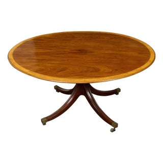 English Mahogany 1840s Oval Top Pedestal Table with Quadripod Base and Casters For Sale