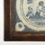 This 18th-century Portuguese azulejos tile features a hand-painted blue on white figurative vignette. It is framed in a...