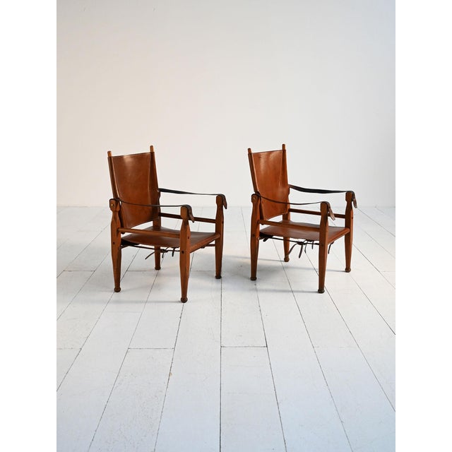Scandinavian safari chairs from the 1950s in beech and original leather with adjustable backrest. Pair of Scandinavian...