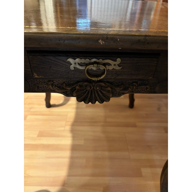 Classic game table made by Baker Furniture Co. pull out cup trays. Leather inserts top with gold trim design and French...