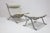 This rare easy chair with matching stool, model Ari, designed by Arne Norell and produced by Arne Norell AB in Aneby,...