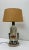 A stunning vintage earthenware /ceramic table lamp base from the mid - 20 Century. The lamp base features the iconic...