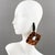 These rare, stunning, important clip-on earrings by Gerda Lyngaard for Monies feature a dangling geometric shape with a...