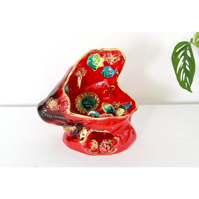 Stramunita is a beautiful mid-century shell lamp realised by Vallauris at the beginning of 1960s. This hand-crafted piece...