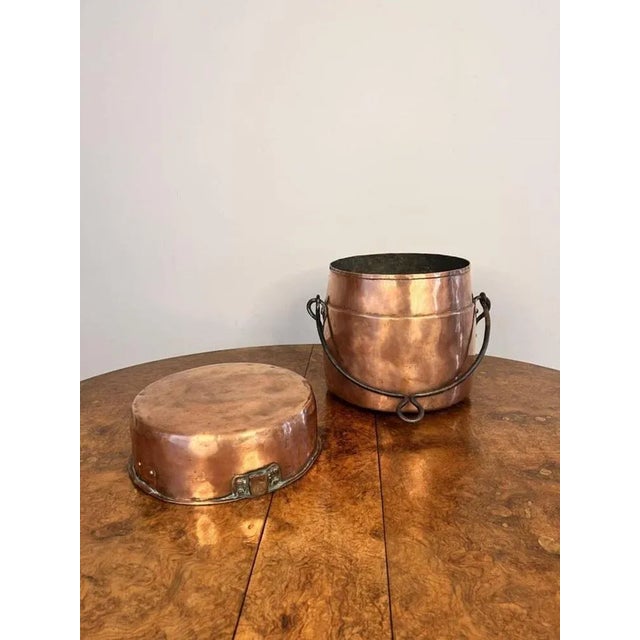 Quality antique George III copper cooking pot, having a iron swing handle and a removable copper lid, to the front PCN...