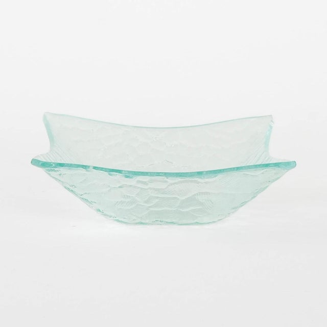 Artistic glass bowl manufactured in the 1970s, Danish production. A charming bowl made of thick, embossed glass in a...