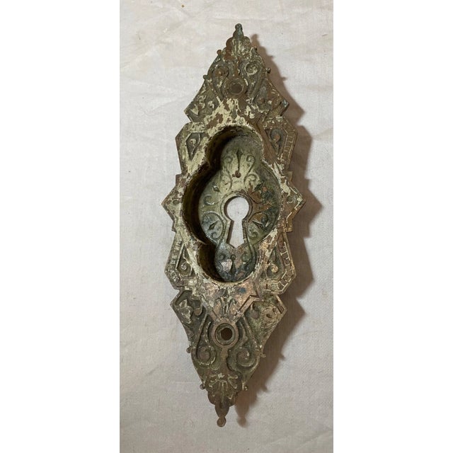 Up for sale is a high quality antique 19th century Eastlake cast iron escutcheon door plaque. It's cast out of thick cast...