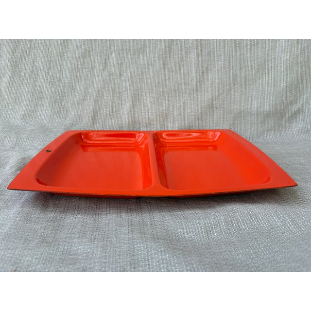 Simple, heavy vintage solid bright orange divided enamel tray. Open metal grommet at one end so it can be hung and stored....