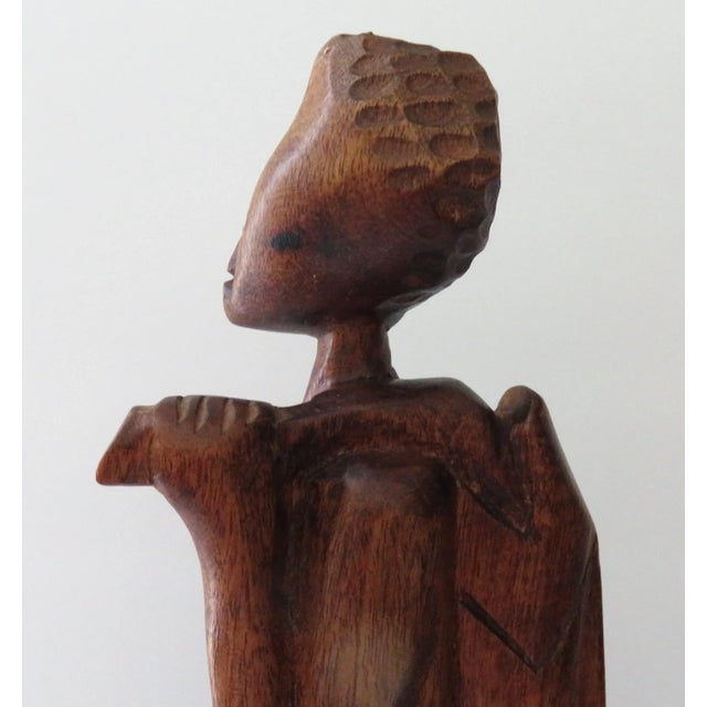 Hand-Carved Wooden African Tribal Hunter Vintage Statue 15" Excellent vintage condition. Clean. No damage. Beautiful piece...