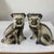This delightful vintage pair of seated Pug figurines features wonderfully expressive faces, sculptural forms, and a...