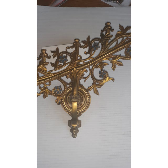 Old Hollywood glamour candle holder wall sconce. Seven lights upward design. Finished in gilt gold with blue flowers....