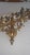 Old Hollywood glamour candle holder wall sconce. Seven lights upward design. Finished in gilt gold with blue flowers....