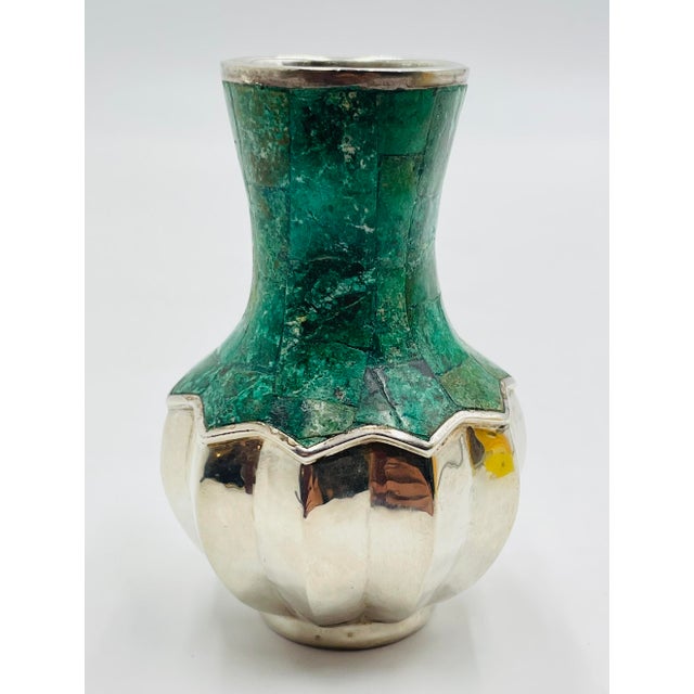 Rare and highly collectible vintage vase designed and handcrafted in Taxco, Mexico by acclaimed Mexican silversmith Emilia...