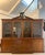 Large Antique George III quality mahogany breakfront bookcase having a swan neck pediment above a dental moulded cornice...