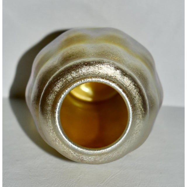 Antique - Early 20th Century Vase from L.C. Tiffany. Made of Favrile Art Glass . Gold/Irredesent Color. The Measurements:...