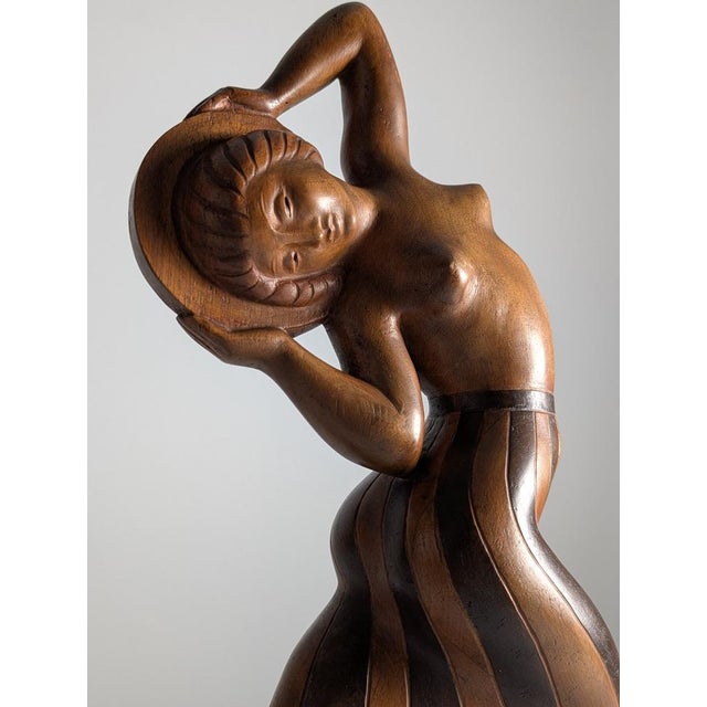 Art Deco sculpture carved in solid wood by Danish artist Jens Jacob Bregnø, circa 1900. The piece bears the carved...