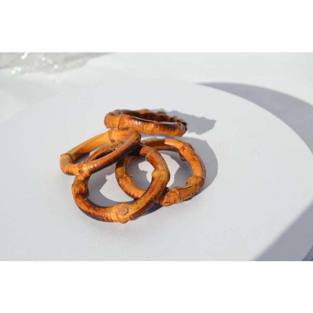 Set of4 burnt bamboo napkin rings. All are in good shape.