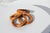 Set of4 burnt bamboo napkin rings. All are in good shape.