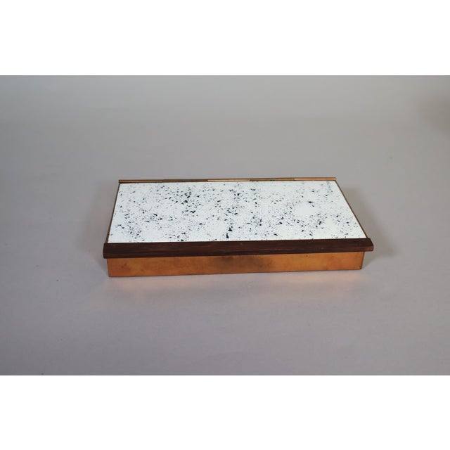 Mid-century Danish Modern rectangular copper box by SPV Denmark, circa 1960s, featuring a distinctive white with black...