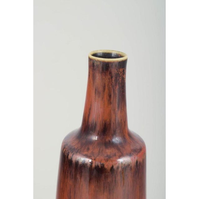 Carl-Harry Stålhane for Rörstrand Vase, mid-20th century. Elegant cylindrical stoneware vase with a narrow neck and...