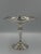 This elegant antique pedestal compote, crafted in sterling silver, exemplifies refined classical design through its...