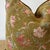 Made in France 100% pure linen pillow printed on a bronze / dark brown linen with floral print. The edges have a binded...