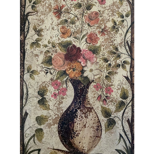 This vintage wall panel features a hand painted still life floral design in the neoclassical style. It has a antiqued...