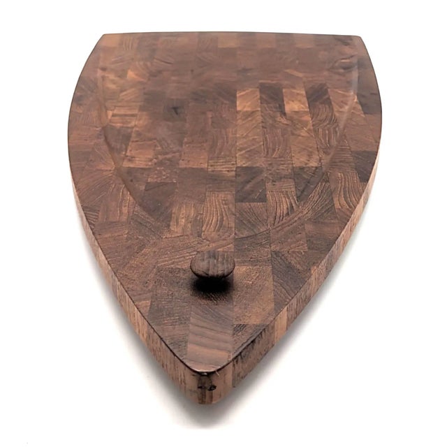 Offered is a wall-hung meat serving or cutting board in solid staved Teak wood. Designed by Flemming Digsmed it was...