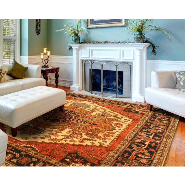 A hand-knotted wool rug in a traditional Oriental design, made in India and measuring 10' x 14'. Fine allover drawing held...