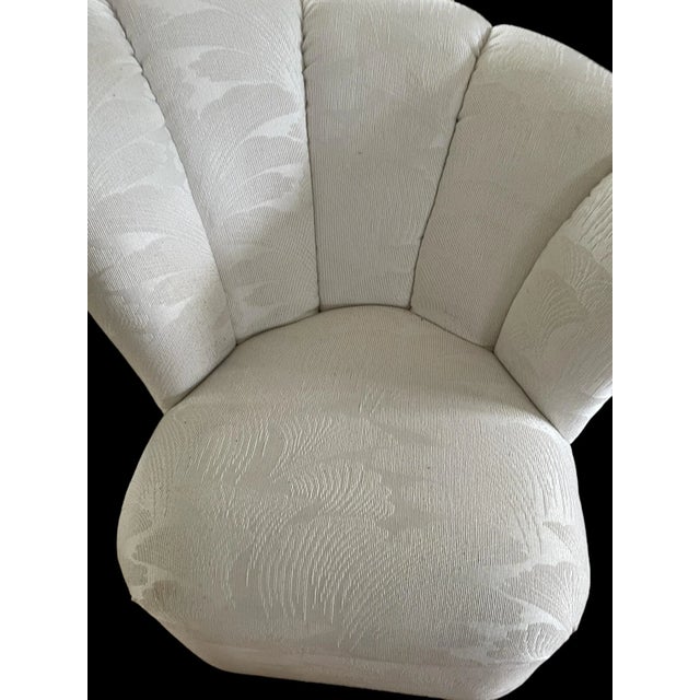 Vladimir Kagan Style Swivel Chair, vintage condition. Clamshell Style Lounge Chair Upholstered in a contemporary fabric....