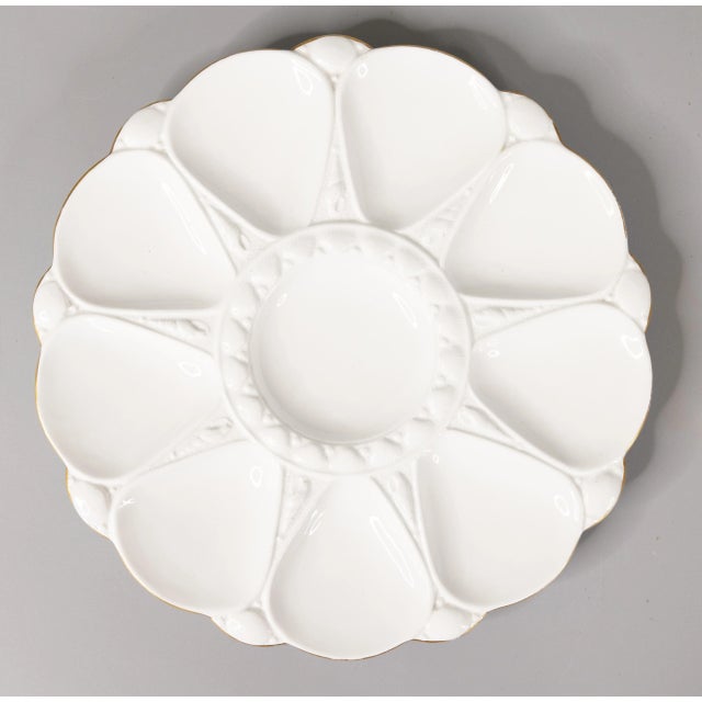 A lovely pair of antique English Minton white porcelain oyster plates. These fine quality oyster plates are a nice large...