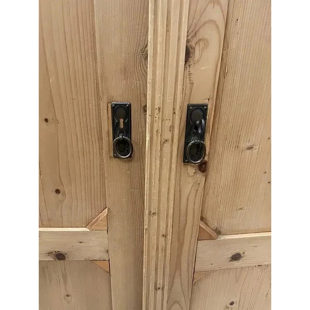 French Two door Rustic Solid Pine Cabinet with Carved Panel Doors and Interior Shelving Handcrafted-style pine cabinet...