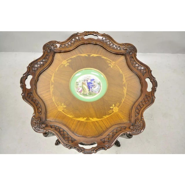 Antique French Louis XV Style Carved Walnut Coffee Table with Angelica Kauffman Porcelain Dish. Item features an artist...