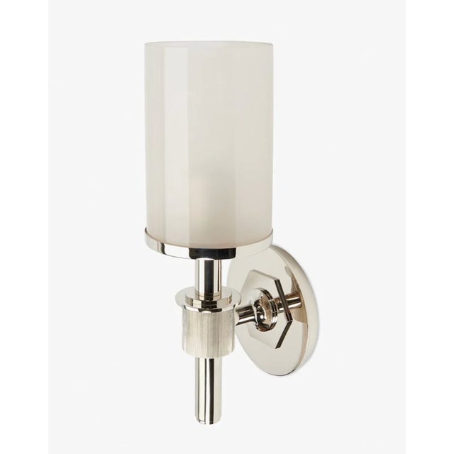 Pair of Henry Wall Mounted Single Arm Sconce with Etched Glass Shade in Chrome. "Celebrating the connection of industry...