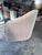 1970s pair of Ward Bennett for Brickel Associates barrel lounge chairs in fabric on castors. Each chair measures 32 inches...
