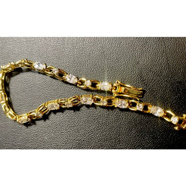 Metal 1960s Ballou company/B.A. Ballou & Co. Gold Plated Earrings and Clear Unmarked Cz Tennis Bracelet, 3 Pieces For Sale - Image 7 of 8