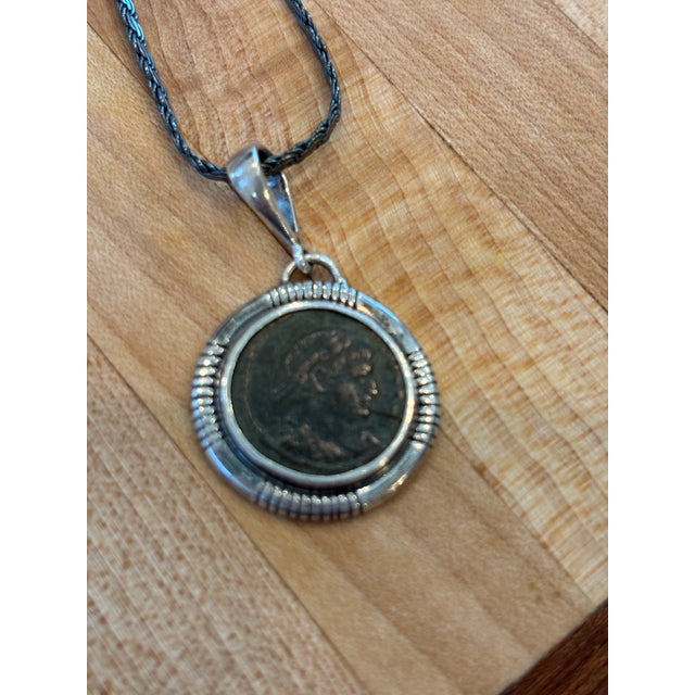 A wonderful pendant made from a Roman coin of Emperor Crispus from 317-326 AD. This is an artisan-made custom pendant with...