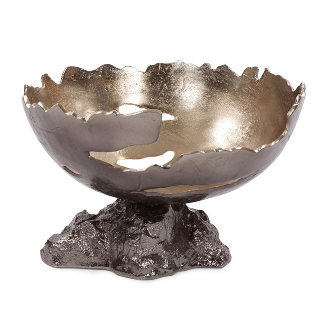 Made out of cast aluminum, these abstract bowls took their inspiration from artifacts found in and around Italy's Pompei...