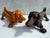 A charming and characterful pair of vintage cast iron dachshund boot scrapers. Originally designed as practical doorway...