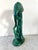 A lovely ceramic statue of a flamingo, glazed in emerald green. This statue adds a pop of color to any tabletop, etagere...