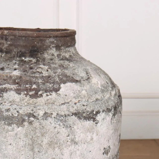 Large early 20th C painted terracotta olive jar. Would make a great lamp base. 1910. This piece is designed in the style...