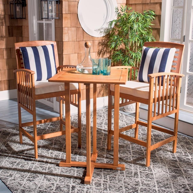 The hottest rooftop bars in Palm Springs inspired this 3 piece bistro set. Crafted in a warm natural finish, its...