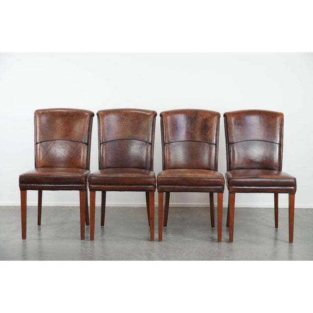 We are offering this comfortable set of 4 beautiful sheepskin dining chairs with character and beautiful warm colors. This...