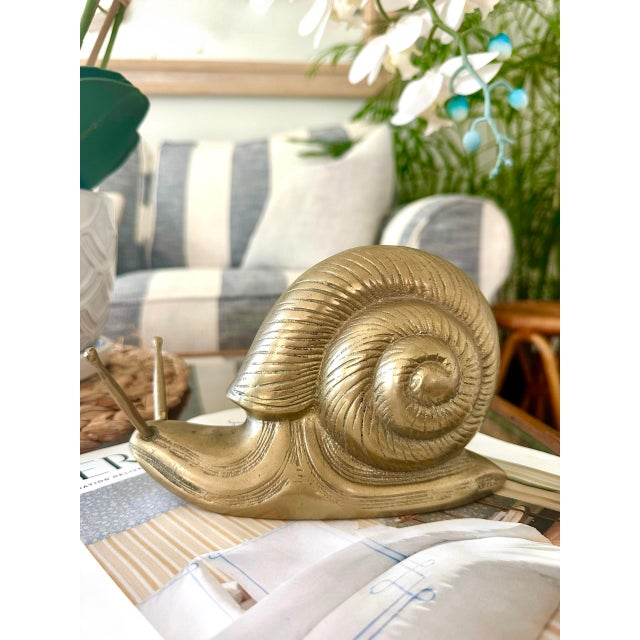 Stunning solid brass snail figurine. Excellent vintage condition! Engraving details on the shell and snail for a more...