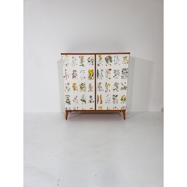 A beautifully preserved Flora cabinet from the 1950s, inspired by Josef Frank’s iconic Flora cabinet, one of the most...
